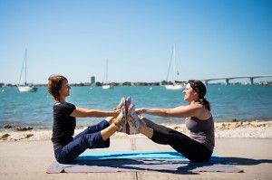 Straddle boat pose